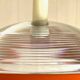 Pair of glass and holophane metal pendant lights, 1970s