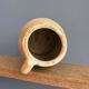 Large earthen pot or jug turned