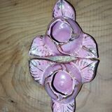 A pair of pink earthenware candlesticks (1940s–50s)