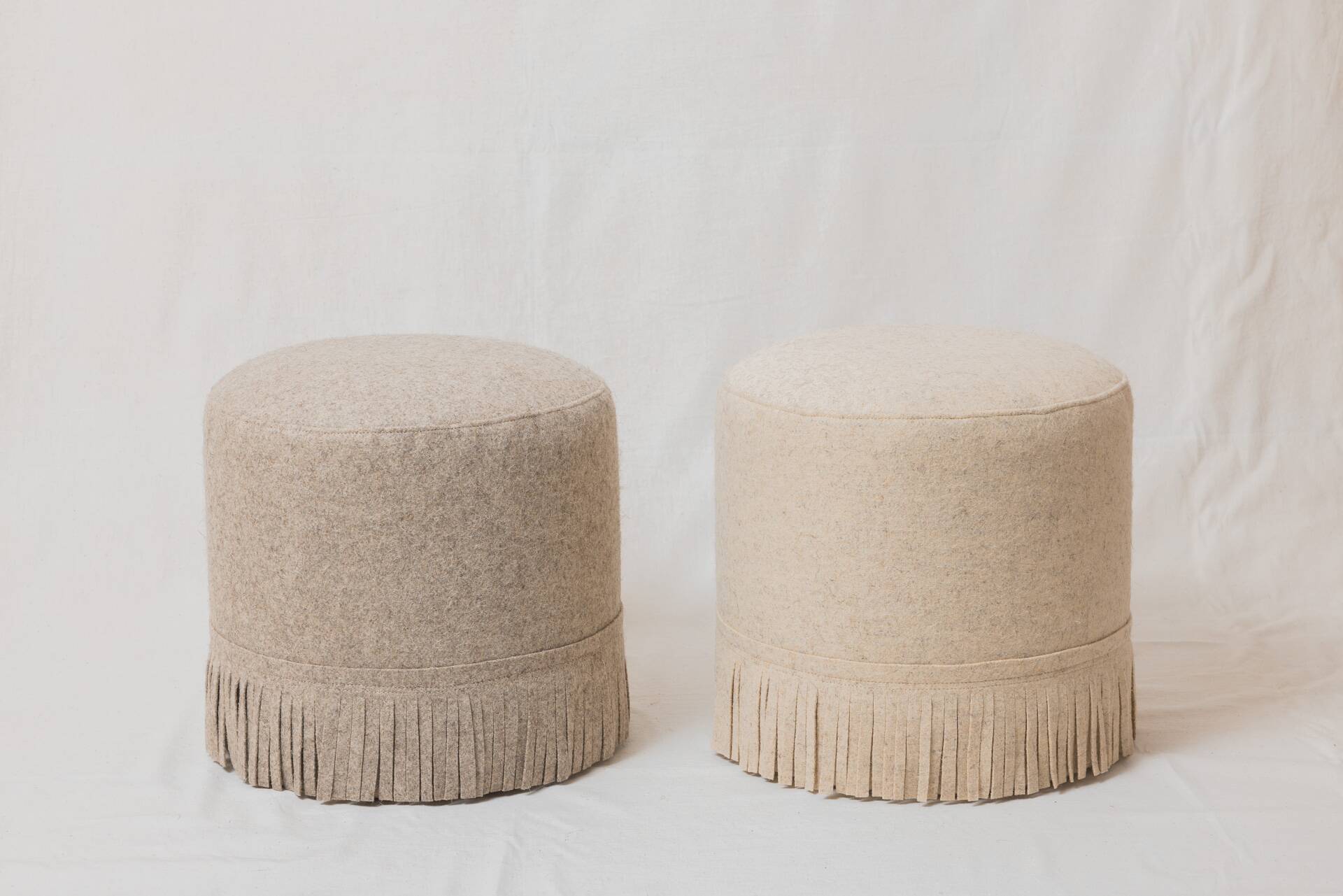 Pair of wool poufs
