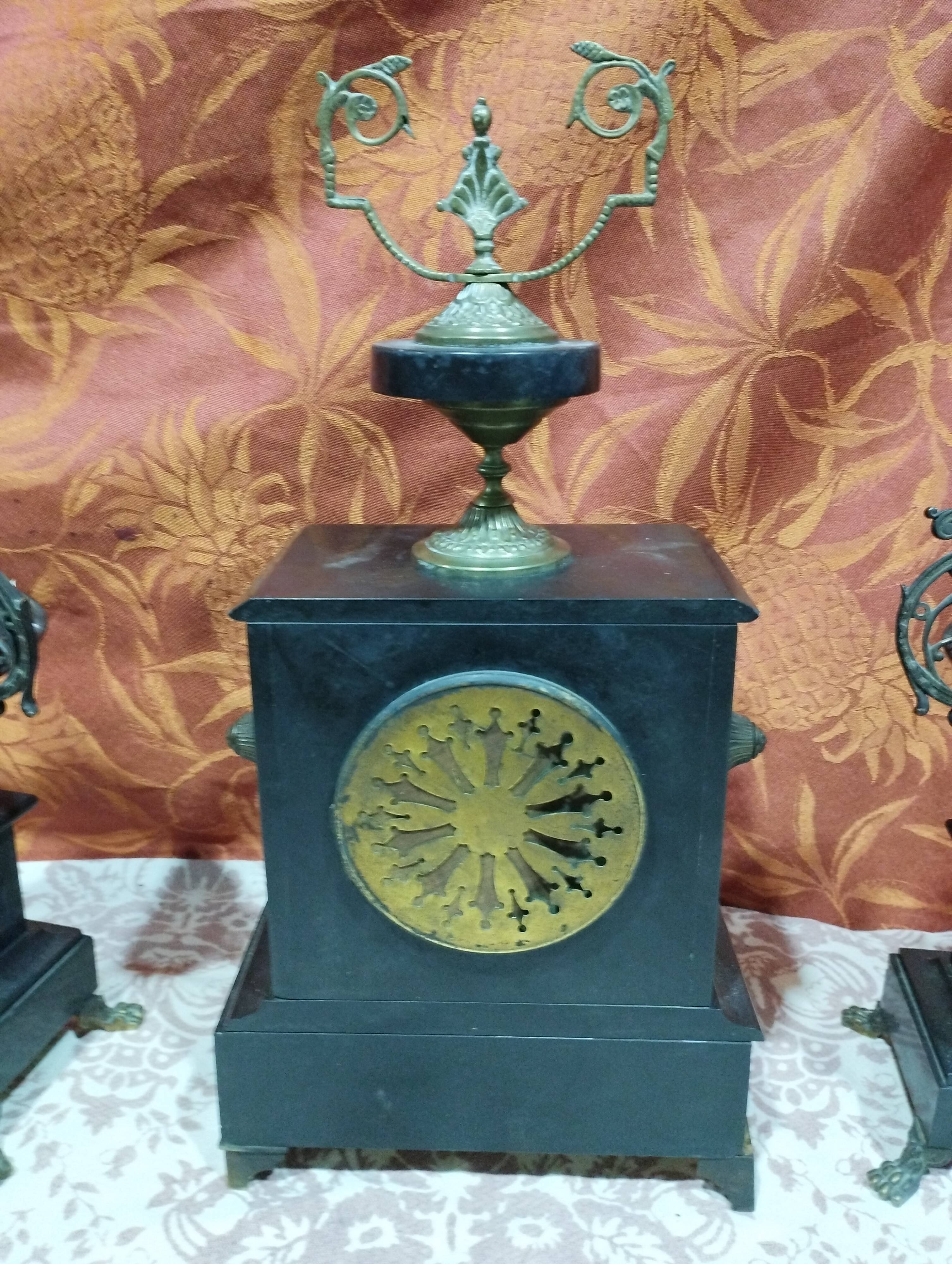 old Napoleon III marble fireplace surround with cups and pendulum