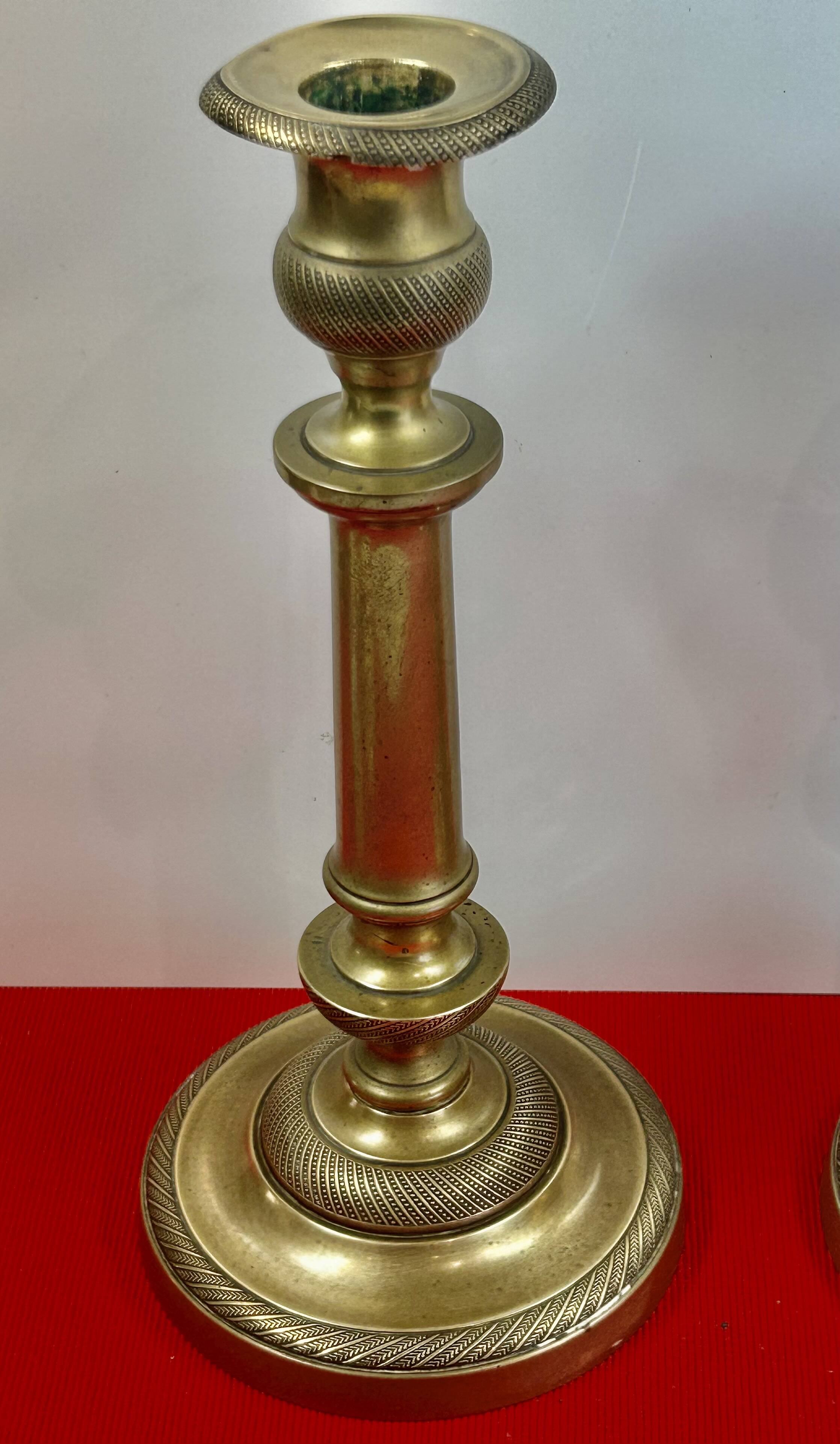 Pair of 19th-century restoration candlesticks in guilloché bronze - H 27 cm