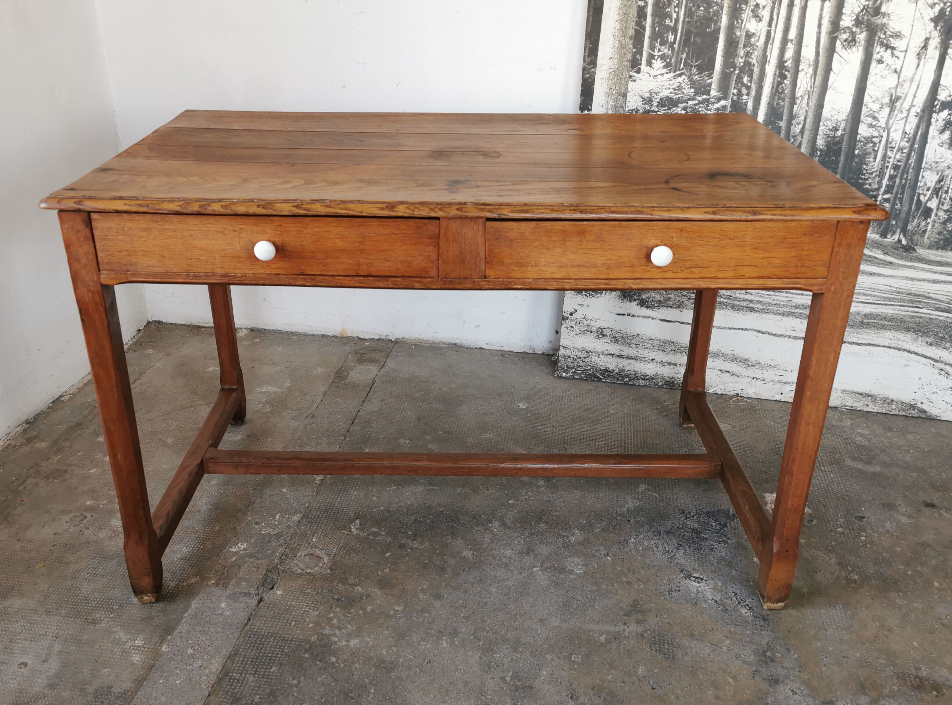 Table in raw oak, countryside.