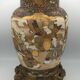 Old satsuma ceramic vase with various decorations mounted on bronze