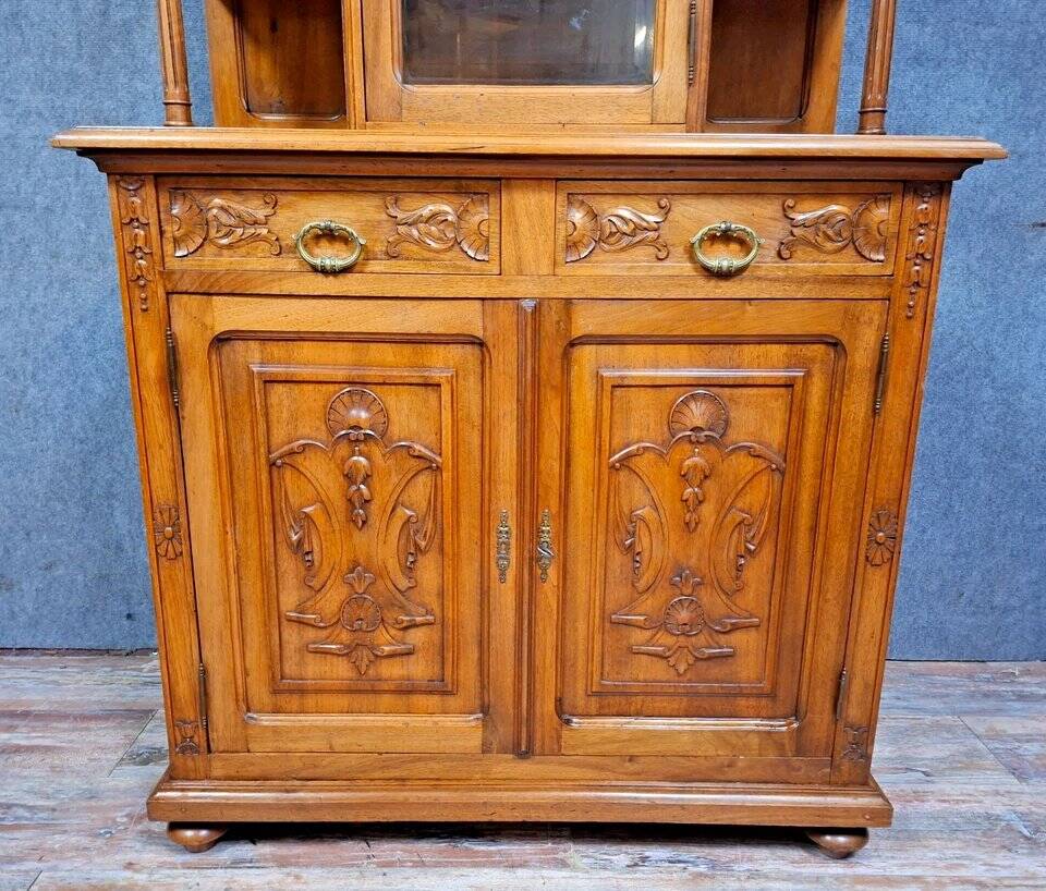 charming and characterful antique walnut two-body buffet.