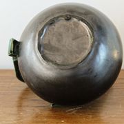 Pitcher in earthenware, metallic black