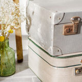Old cream and green coloured suitcase