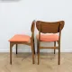 Pair of vintage orange Scandinavian chairs