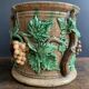 Large 19th century slip pot with vine decoration