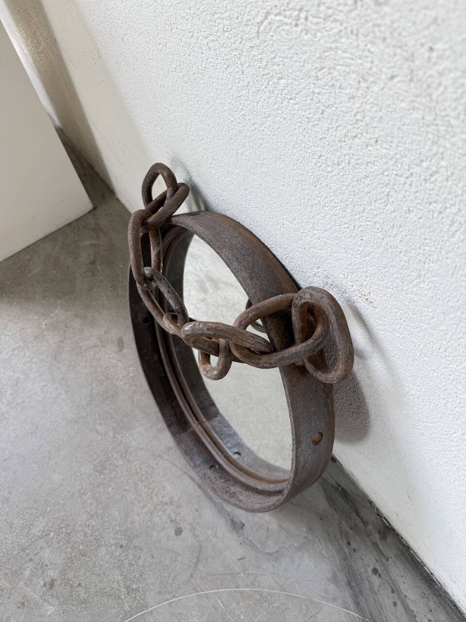 Brutalist mirror with metal chain from the 50s