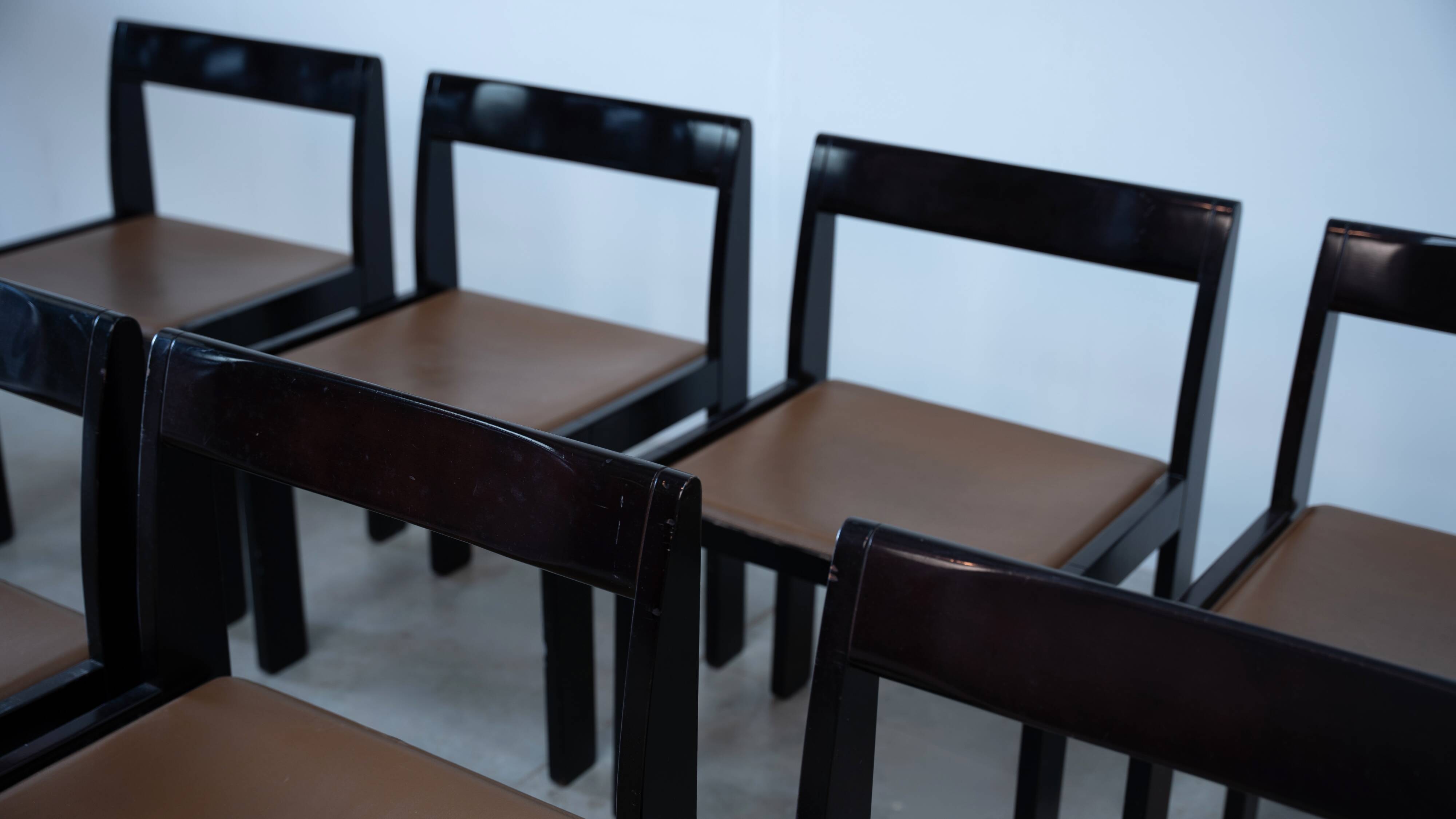Set of eight black lacquered dining chairs
