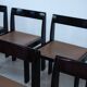 Set of eight black lacquered dining chairs