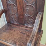 Neo-Gothic style cathedra armchair in carved oak