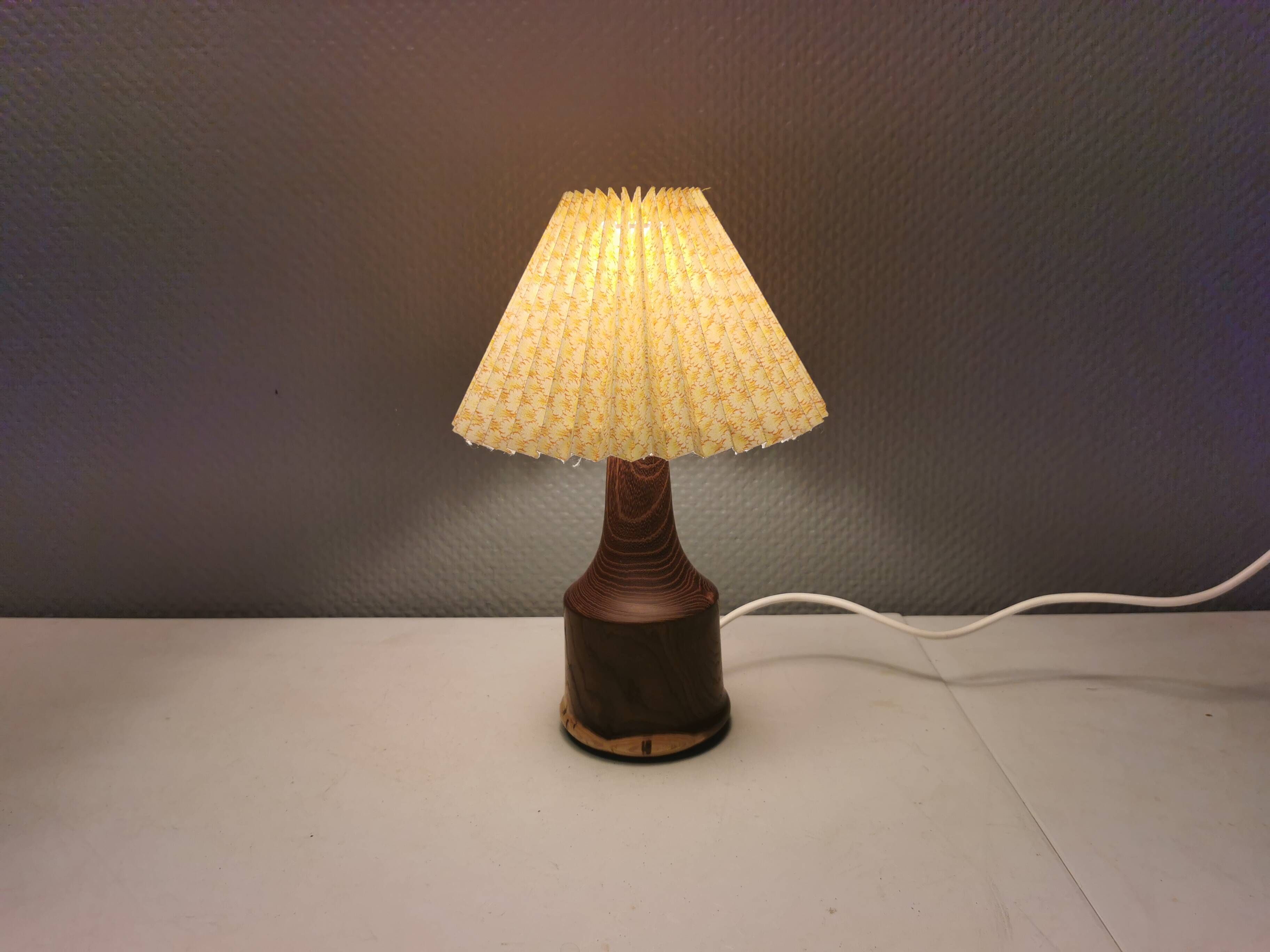 Beautiful sting lamp in twisted wood. Estimated 1970s and Swedish or Danish.