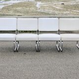 4 chauffeuses formant canapé modulable. acier, simili-cuir, années 70