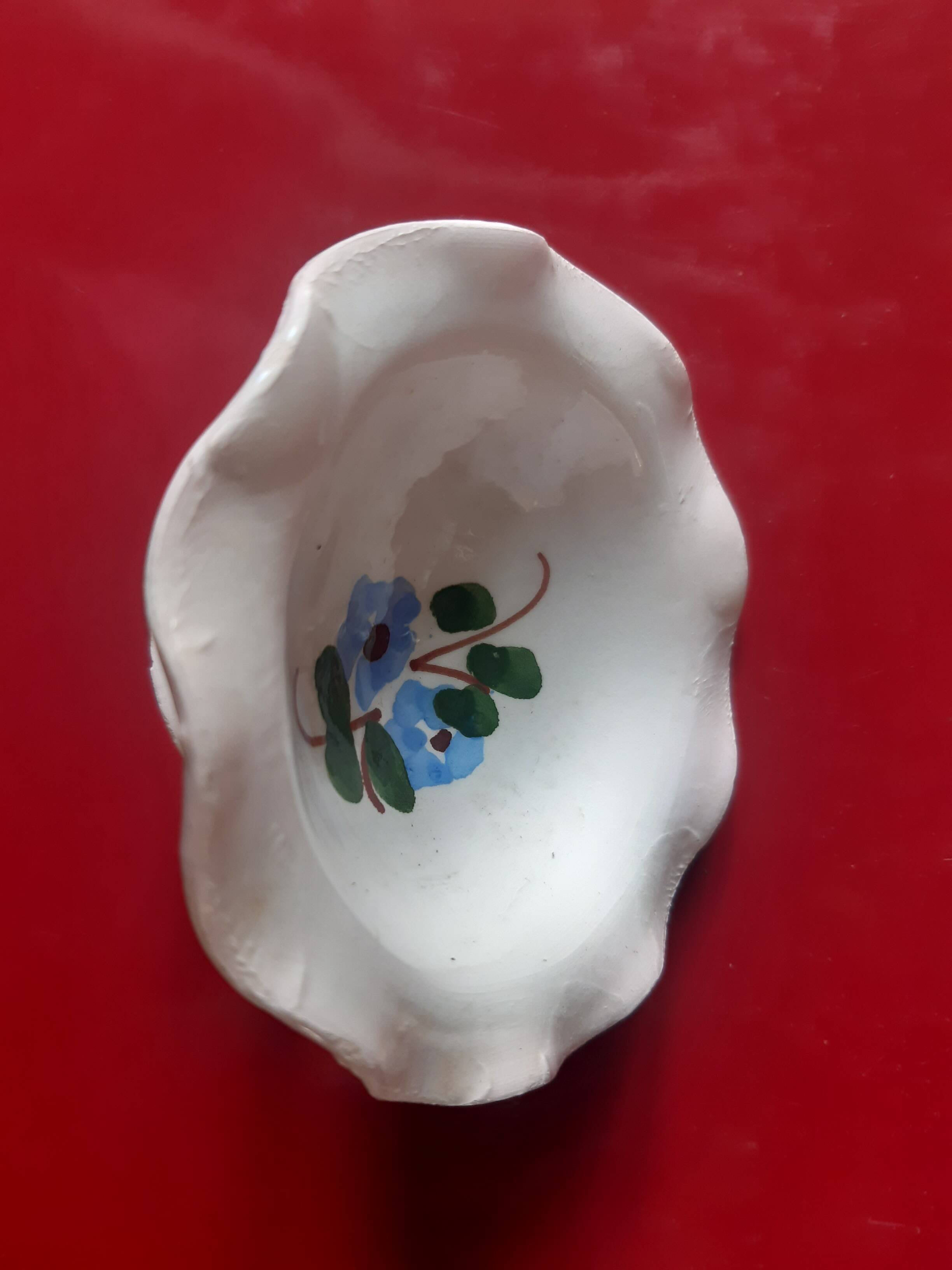 Coupelle vide poche en faïence décor fleuri bleu et vert.