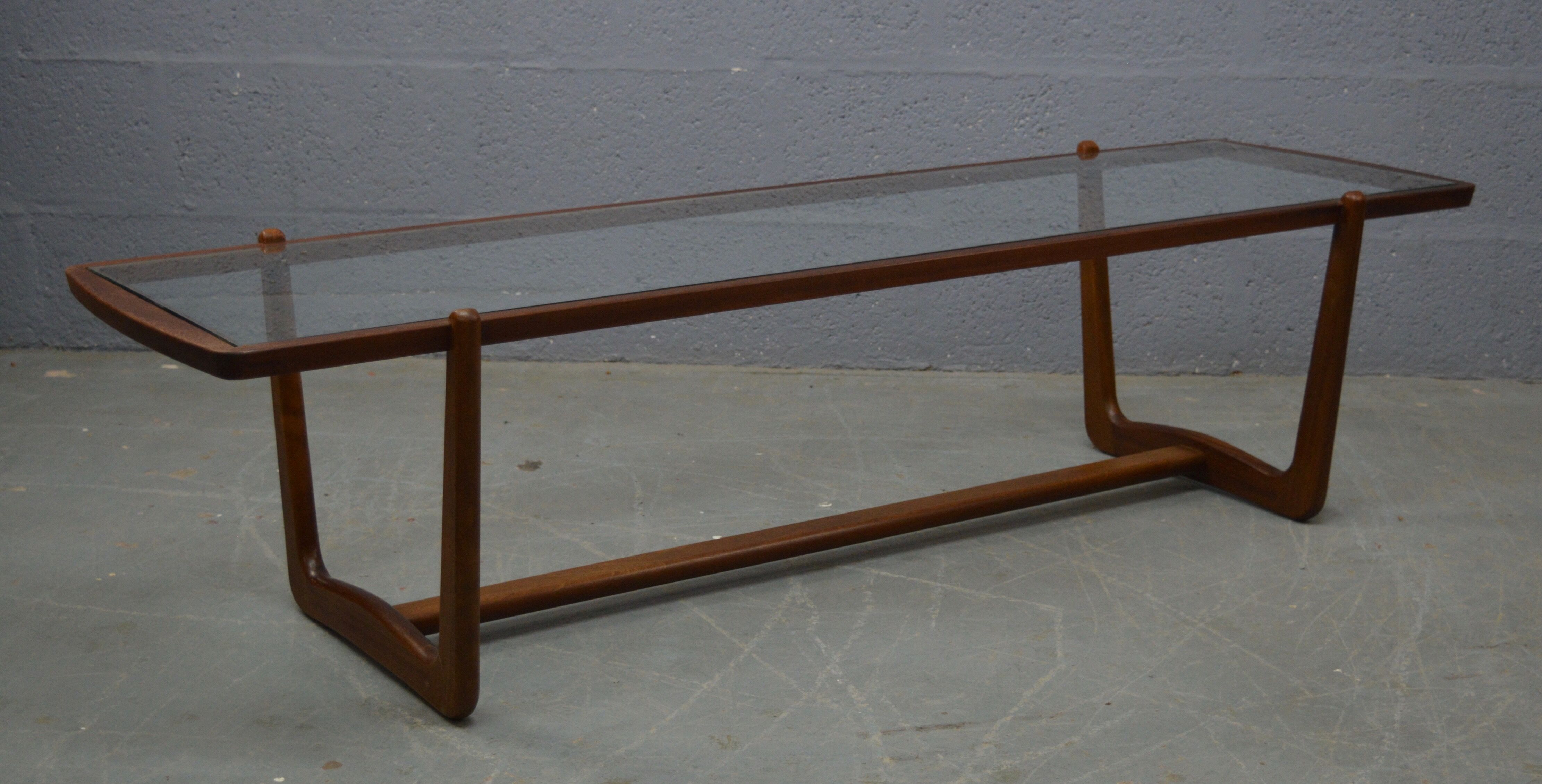 Mid century glass topped coffee table