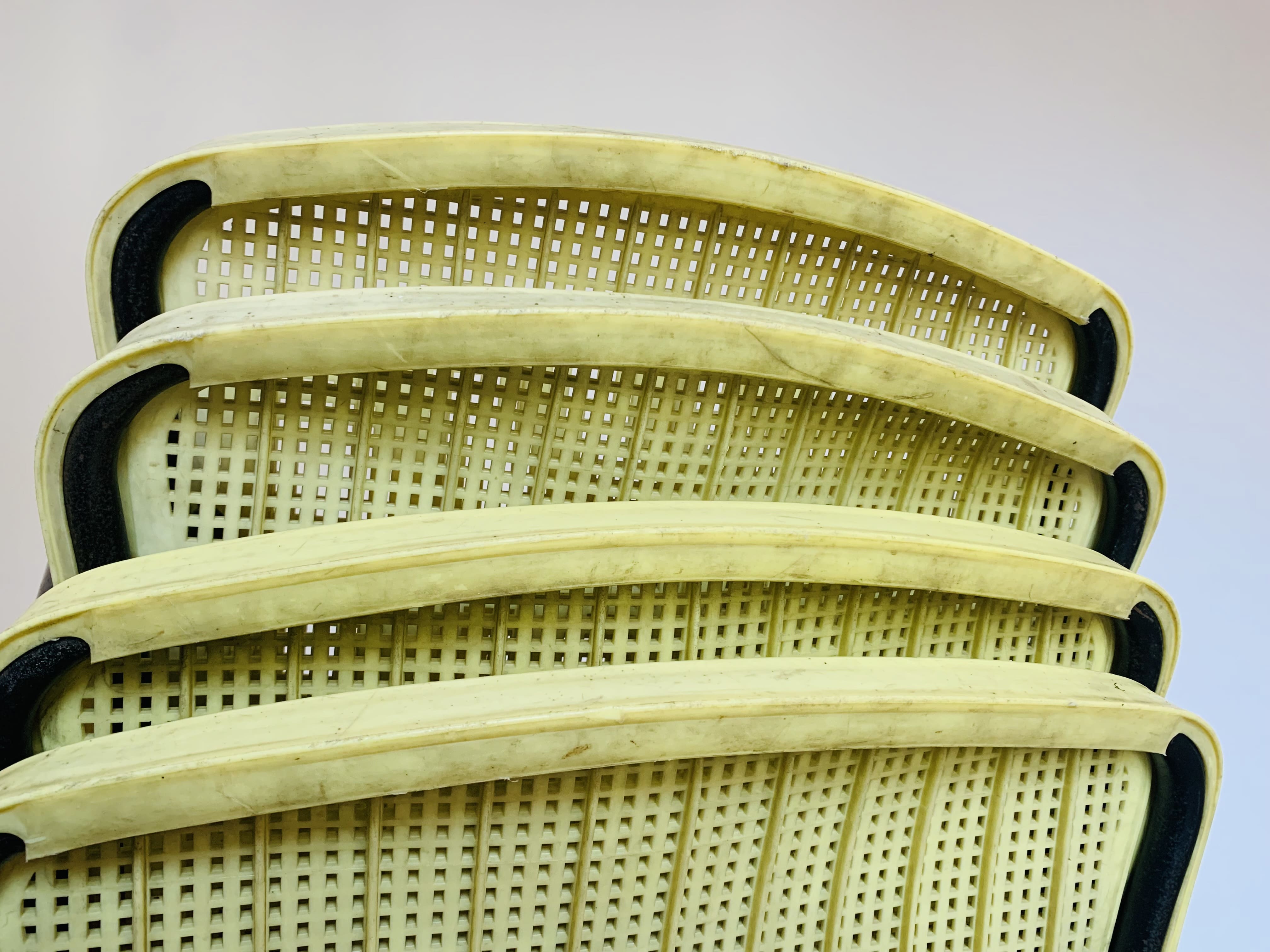 4 yellow outdoor armchairs