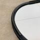 Oval mirror from the 1950s, wrought iron and brass.