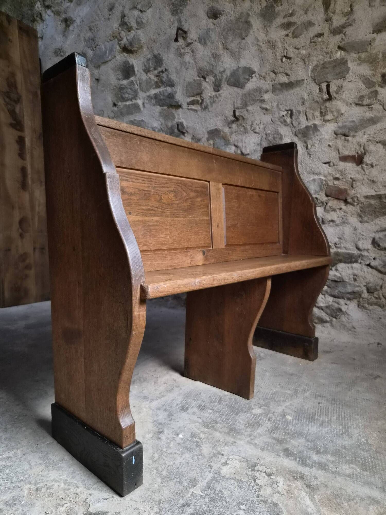 Antique church bench in oak, circa 1900–1920