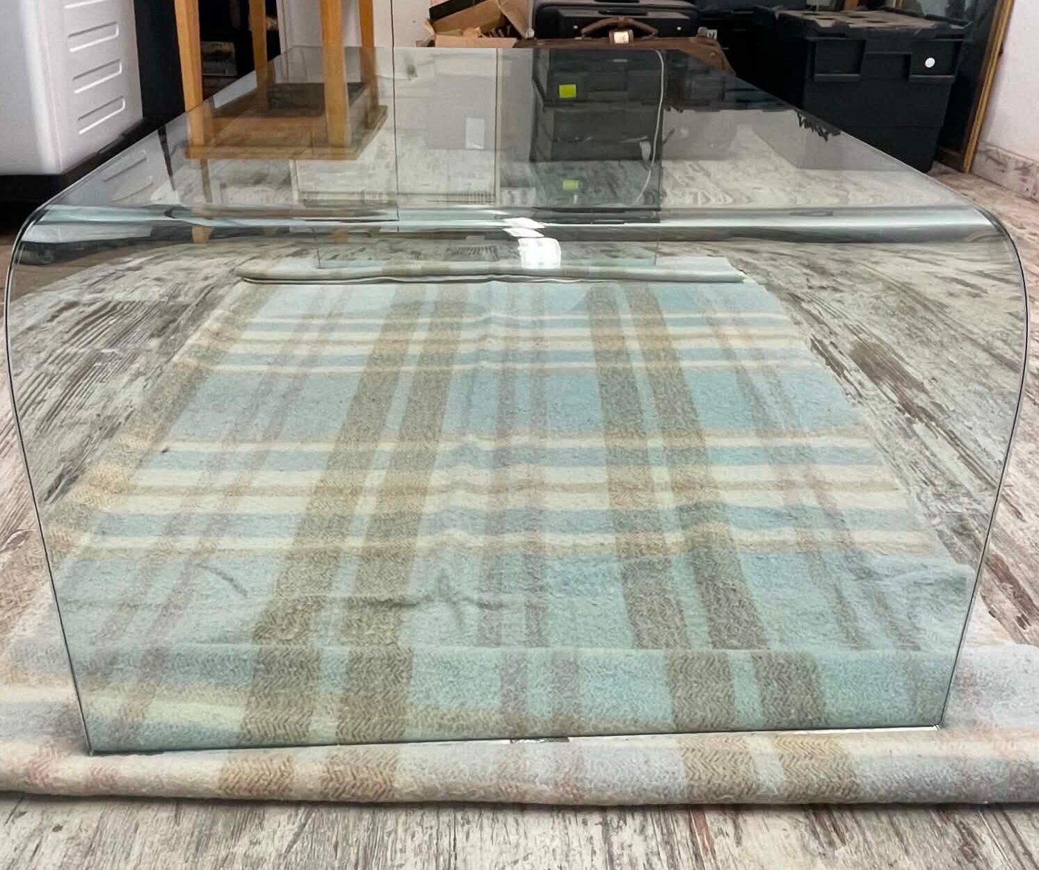Curved glass design coffee table