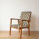 Vintage Scandinavian armchair in wood and woven strap.