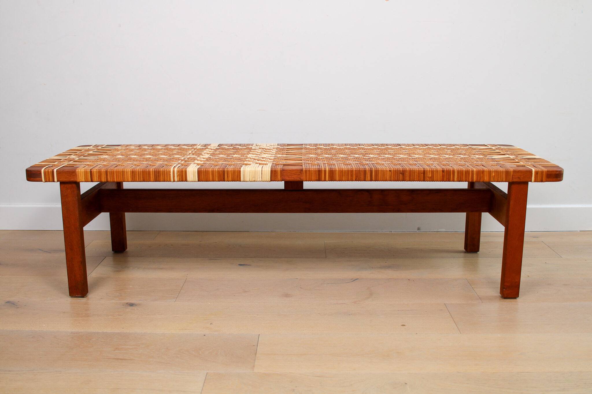 A vintage mid-century Danish Borge Mogensen 5272 rattan coffee table/bench
