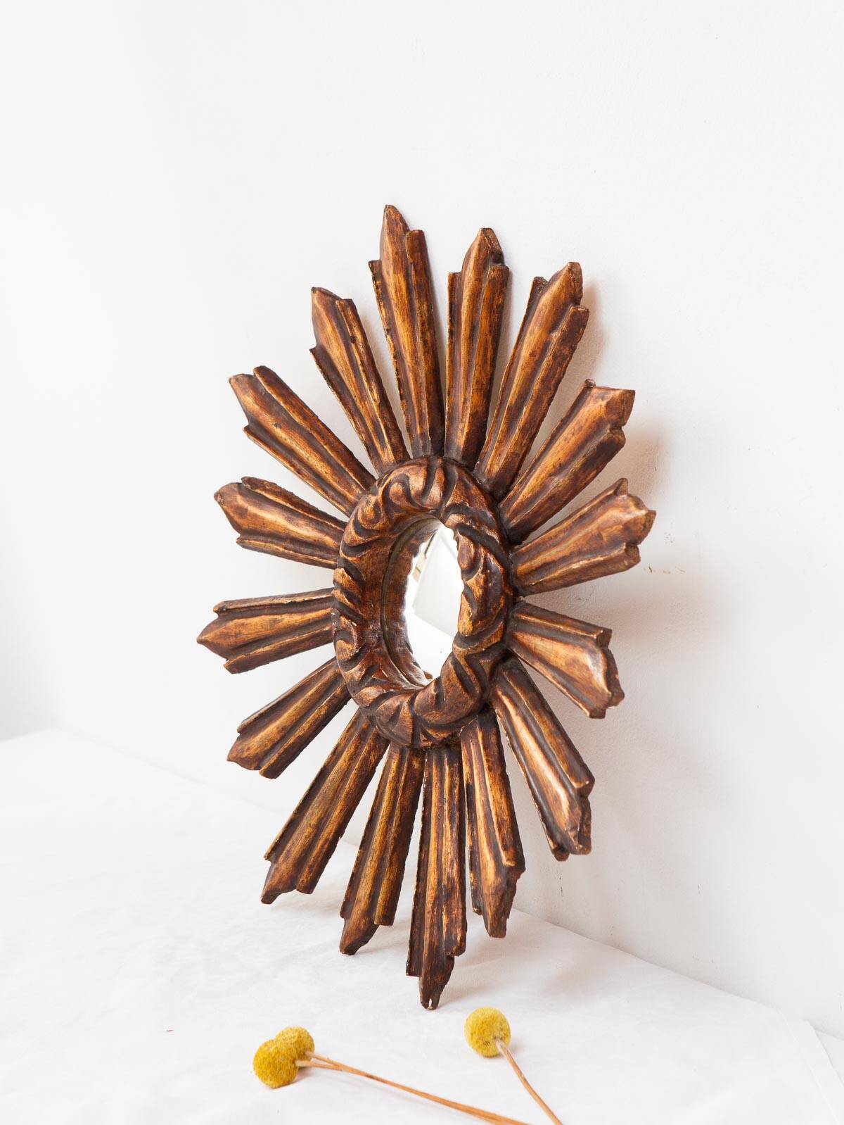 Vintage sun mirror witch's eye in gilded wood (39 cm)