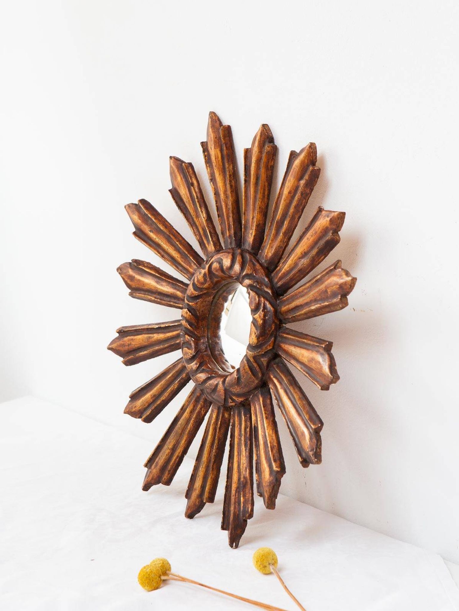Vintage sun mirror witch's eye in gilded wood (39 cm)