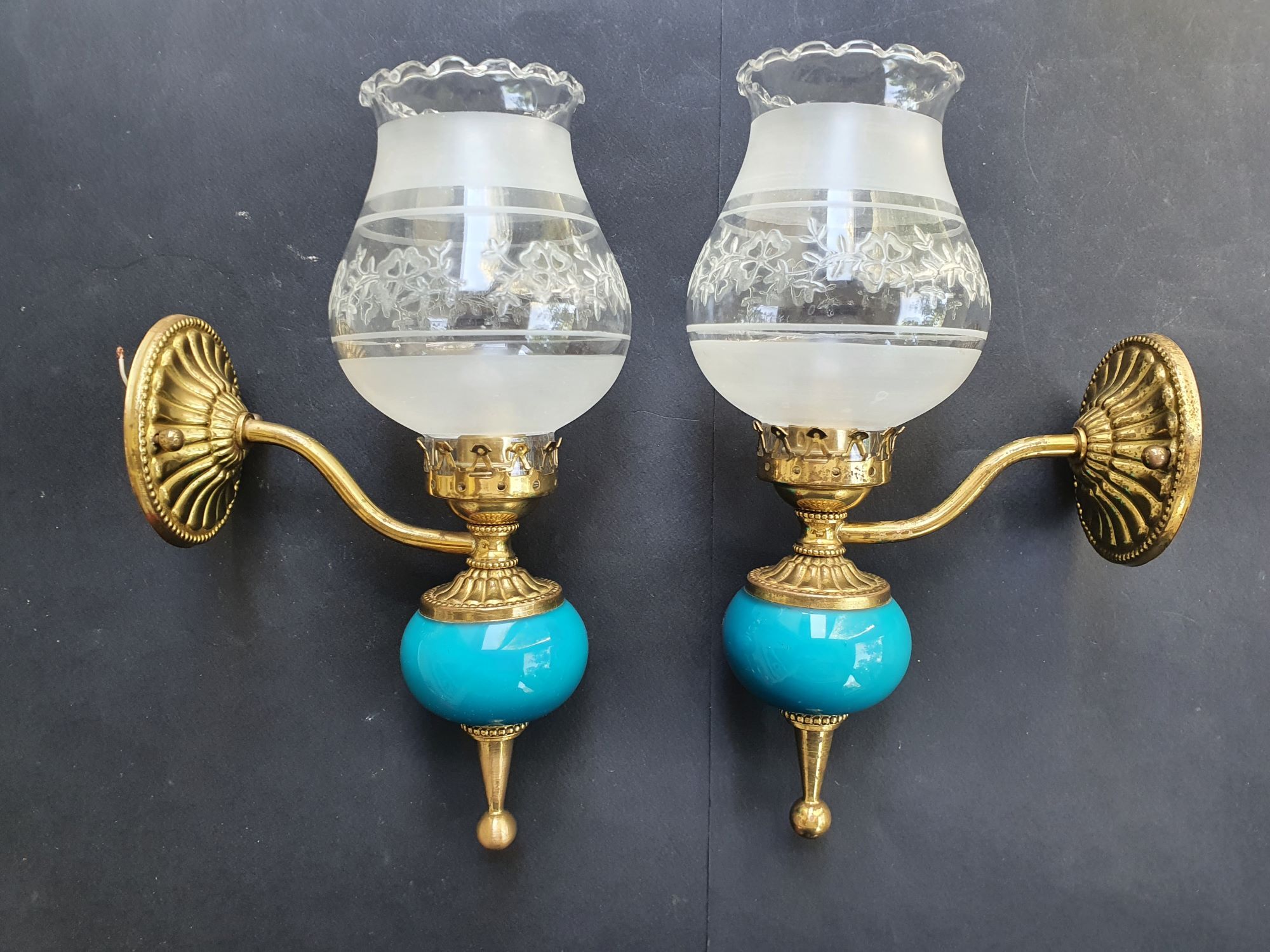 Pair of antique gold wall sconces