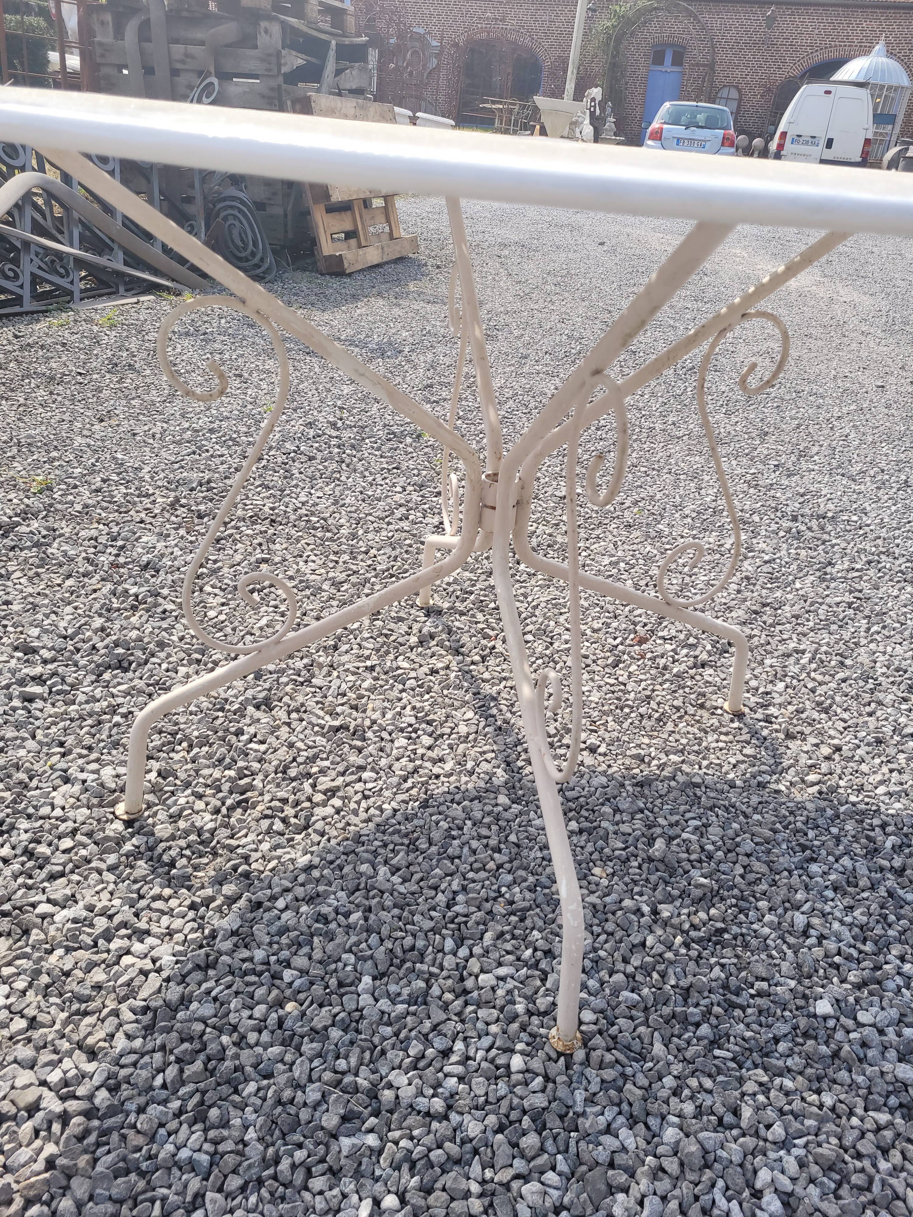 Iron garden table, 117cms in diameter