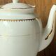 Antique porcelain jug with Limoges enamel