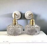 Pair of chiseled glass wall sconces
