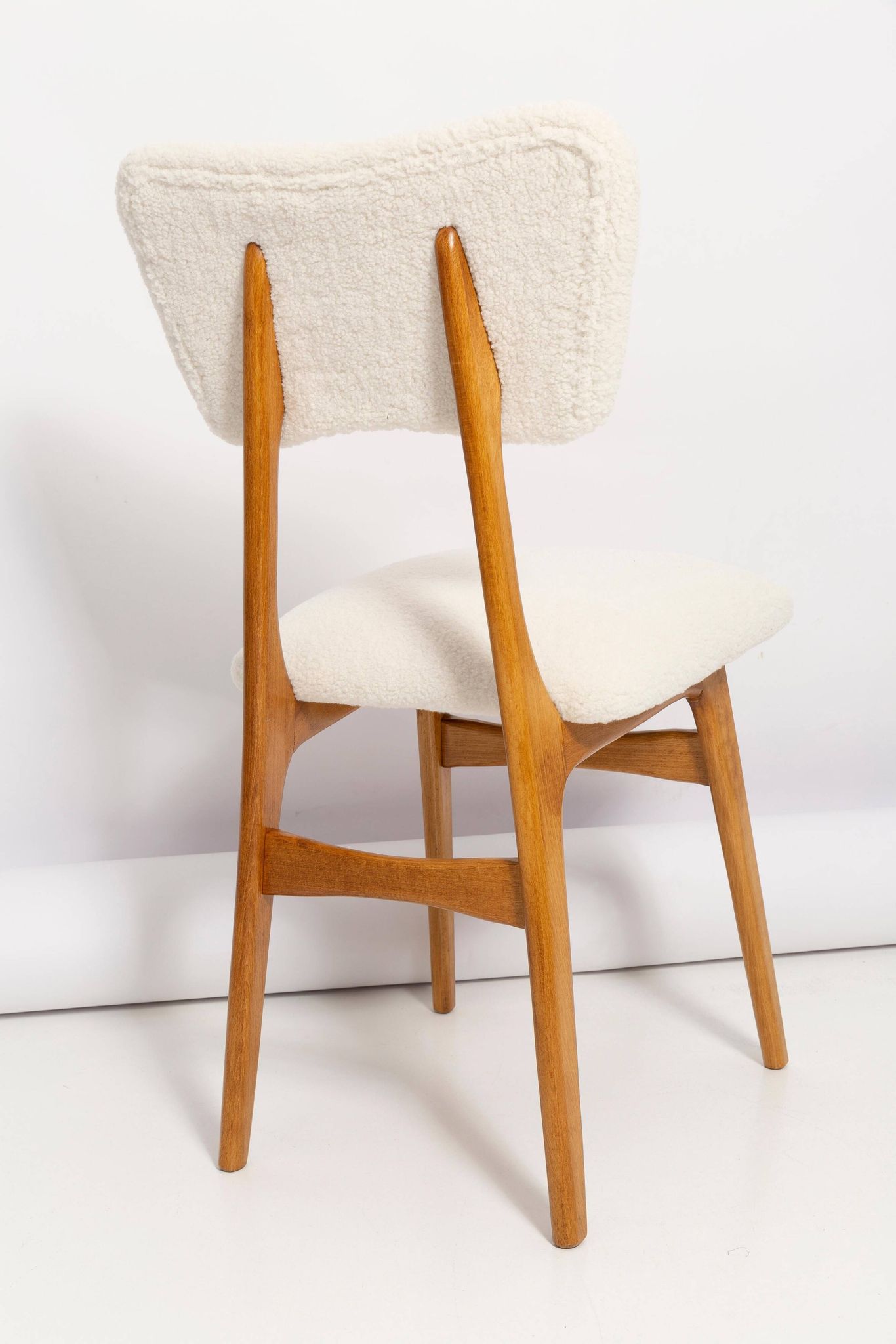 Mid-century "Butterfly" dining chair, light cream boucle, Poland, 1960s