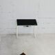 Tubular steel console, black glass tray, circa 1950