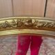 Miroir ovale biseauté bois doré style Louis XVI XIXe siècle