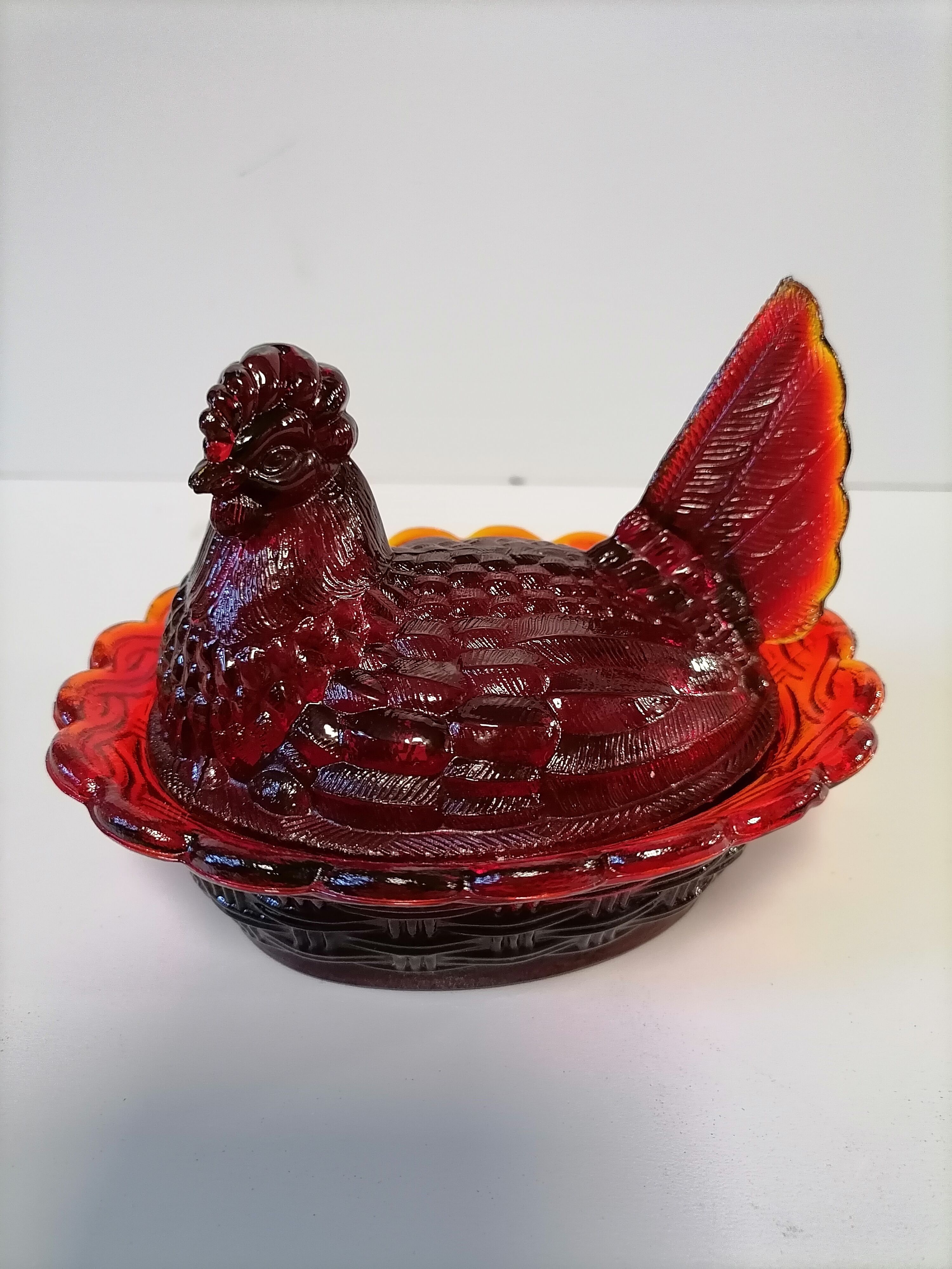 Poule en verre orangé sucrier