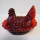 Poule en verre orangé sucrier