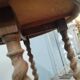 Brass side table with turned legs