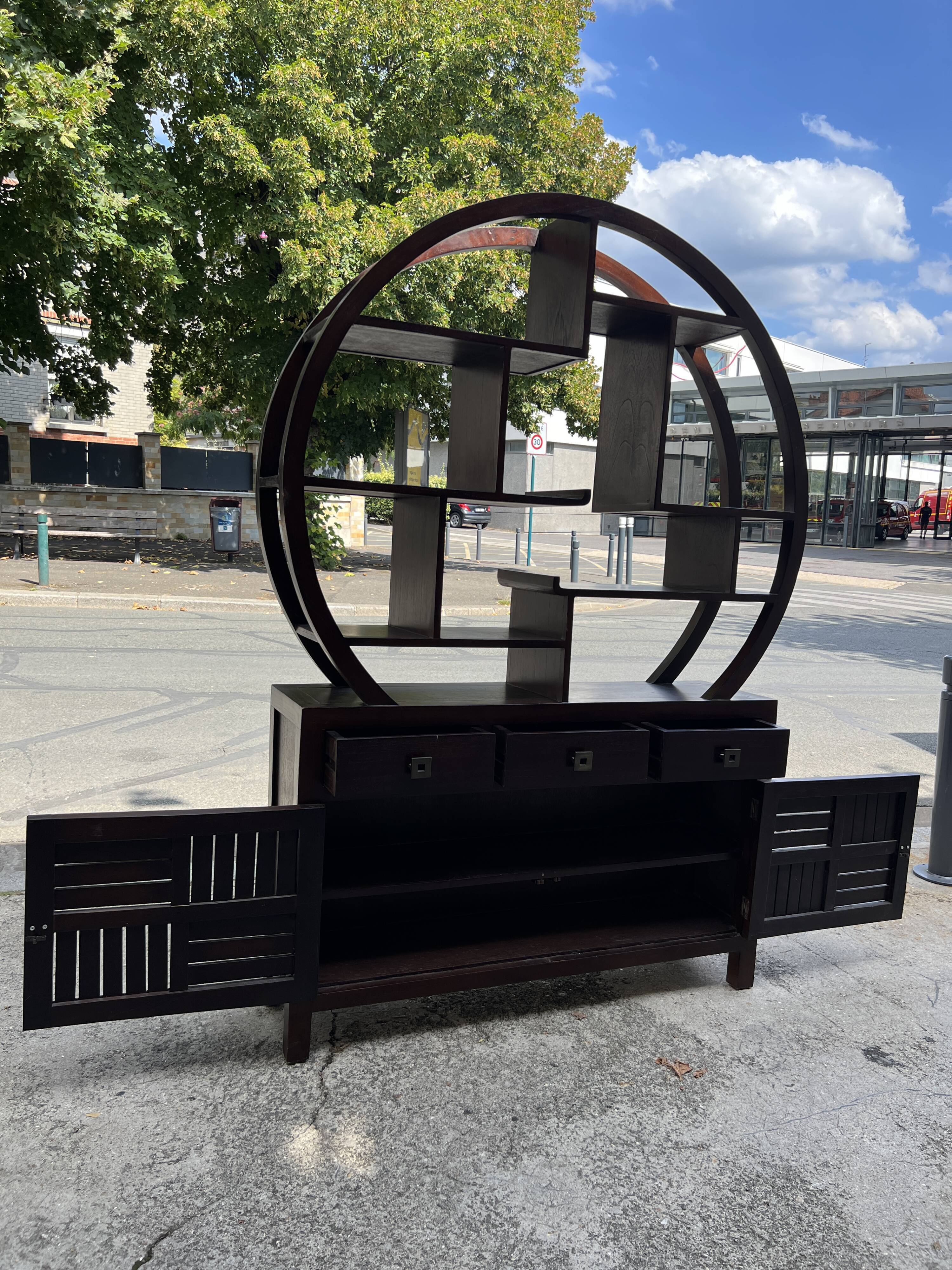 Round galay shelf on bahut sideboard