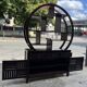 Round galay shelf on bahut sideboard