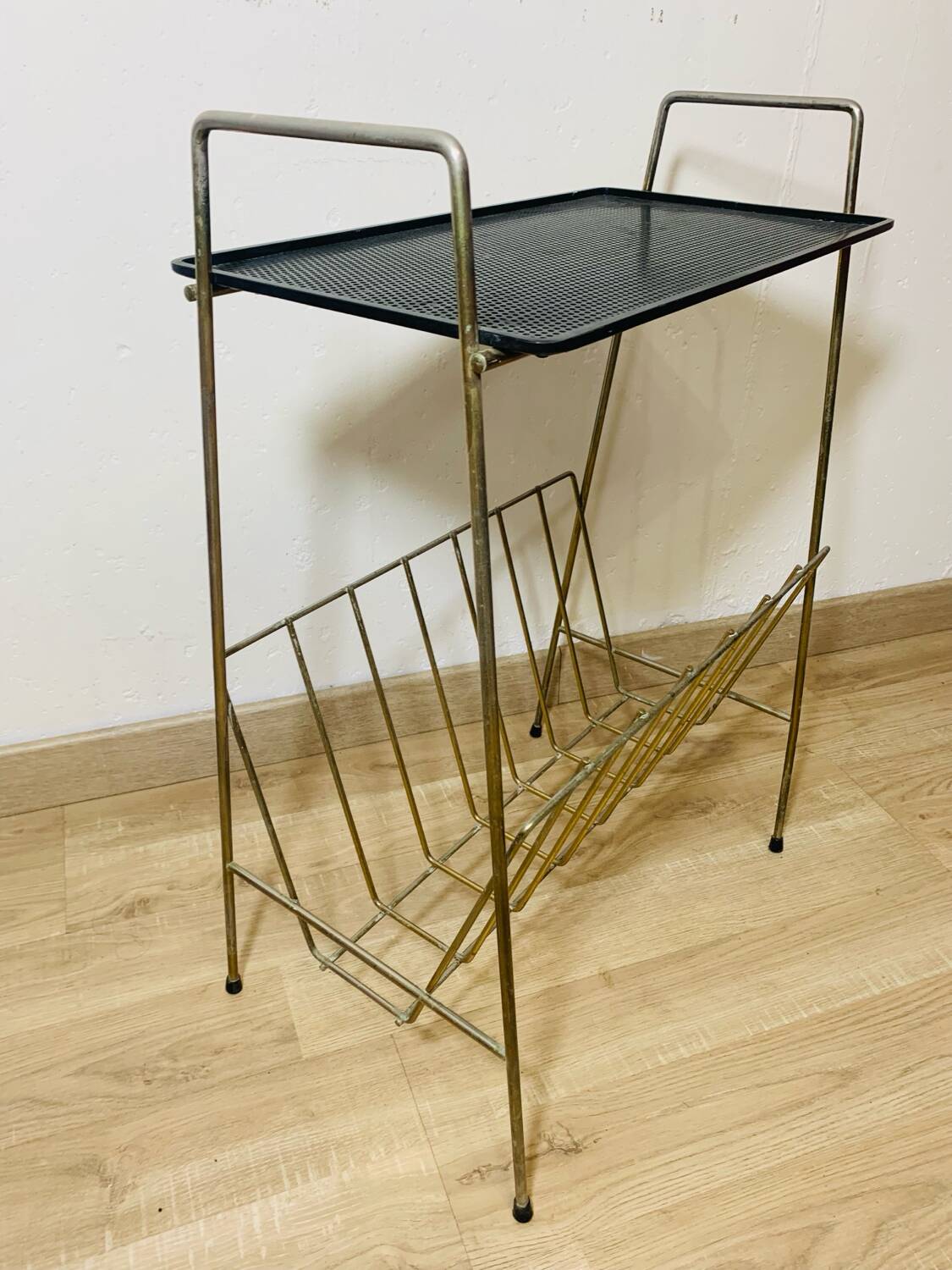 Perforated metal magazine rack