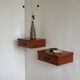 Vintage Scandinavian teak wall-mounted bedside tables.