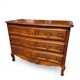 Curved commode in Louis XV style made of cherry wood.