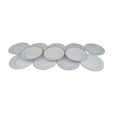 Set of 12 flat plates in white Swiss porcelain double gilded border "VSK USC Viribus Unitis"