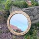 Ceramic mirror "gears" by Mithé Espelt