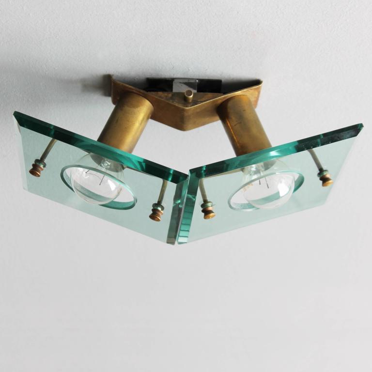 Italian applies in brass and glass cut by Arredoluce