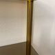 Regency style console table, in gilded metal and smoked glass