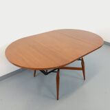 Large round vintage Scandinavian coffee table Smorrebrod by Arne Vodder, extendable into a dining table