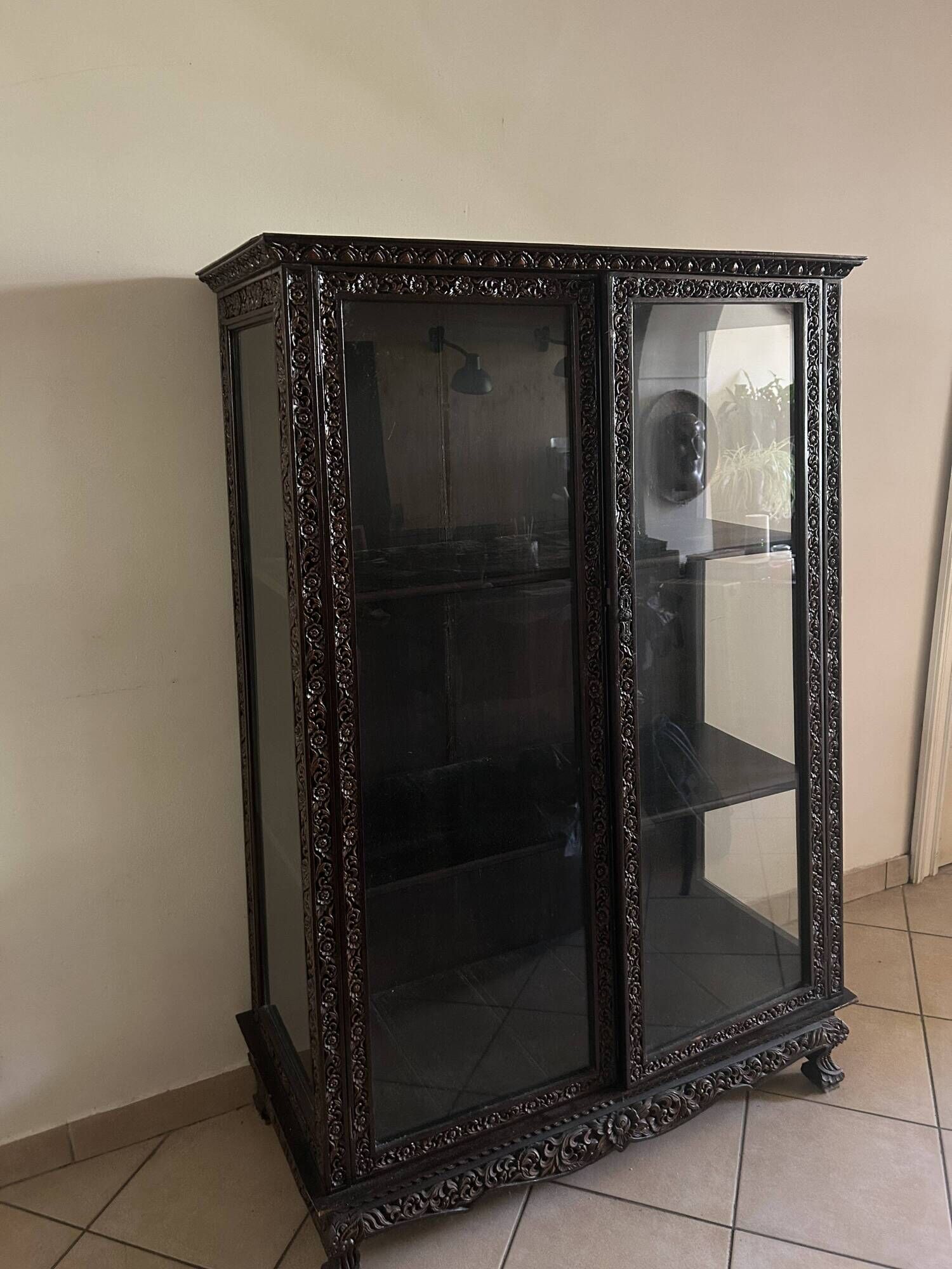 Thai trapezoidal display cabinet in carved solid wood